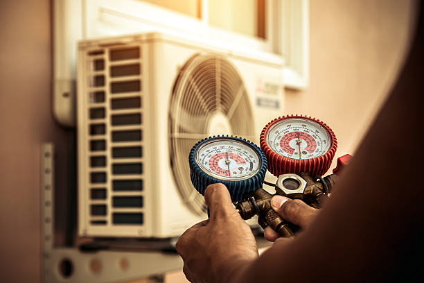 Professional Ac Installation technician working in Bay Minette, AL
